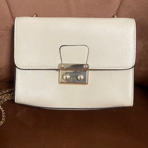 Italian Leather Company Cream crossbody bag.